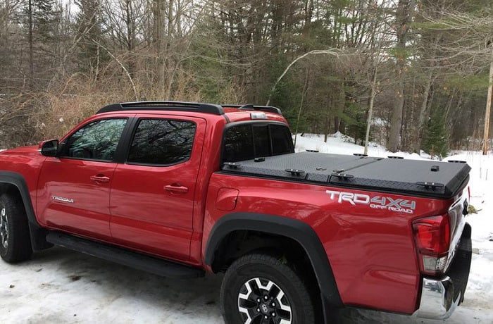 tonneau cover vs topper