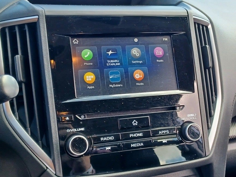Subaru STARLINK and MySubaru icons on the infotainment screen of a 2022 Subaru Impreza